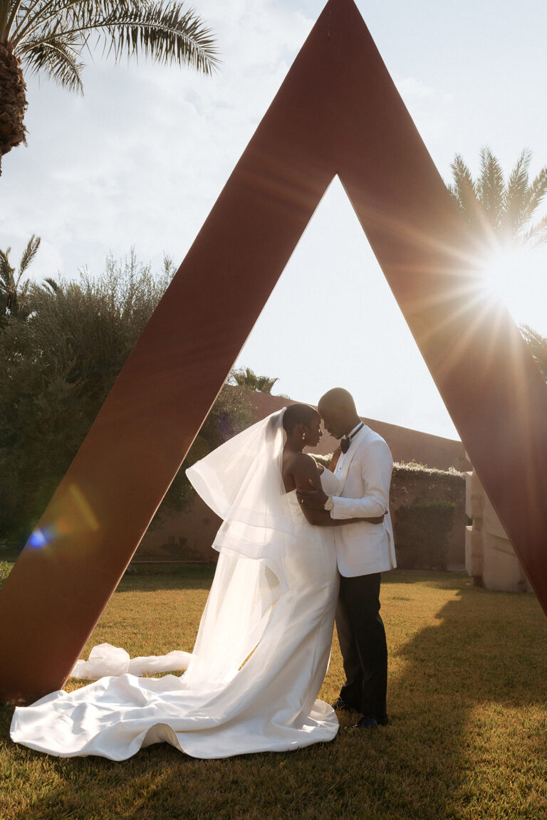 a man and woman in a white suit and white wedding dress, Nigerian wedding