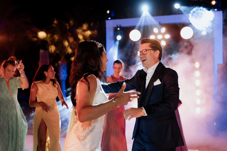 a man and woman dancing at a wedding, moroccan wedding photographer