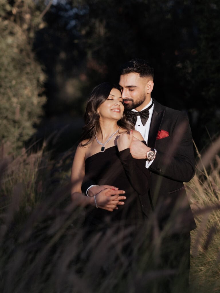Engagement in oberoi marrakech, a man and woman in a field